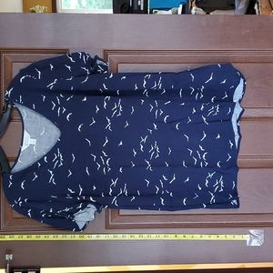 Dark blue with flying birds.